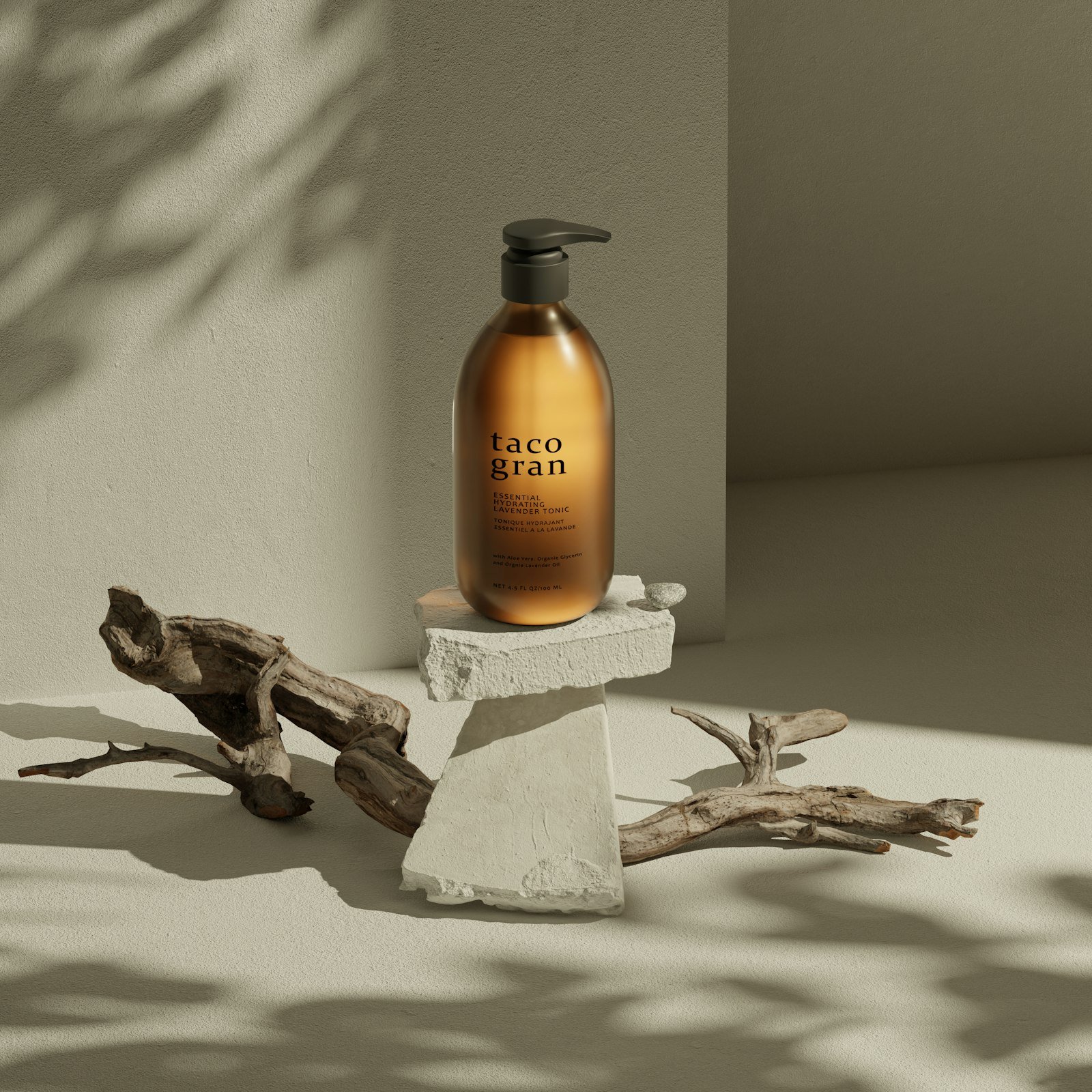 Amber pump bottle on a stone block with driftwood