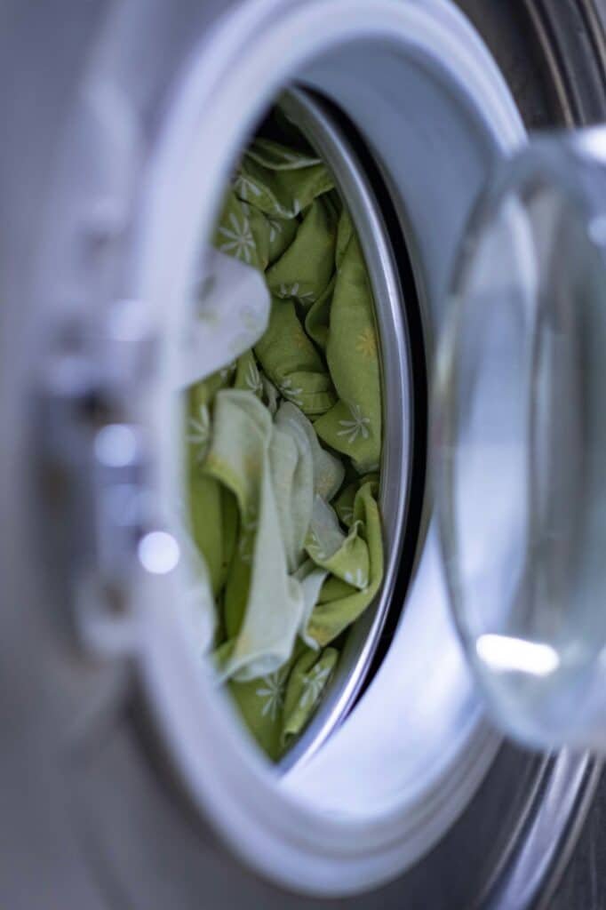 Laundry inside a front-loading washing machine drum