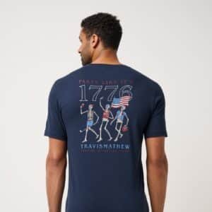 TravisMathew Summer Salute Tee in navy, back graphic